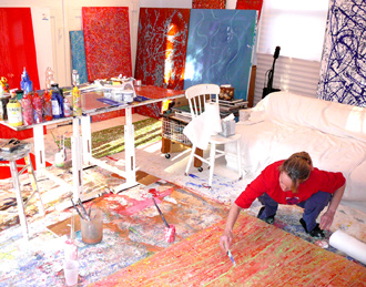 Gini Alter working in her studio